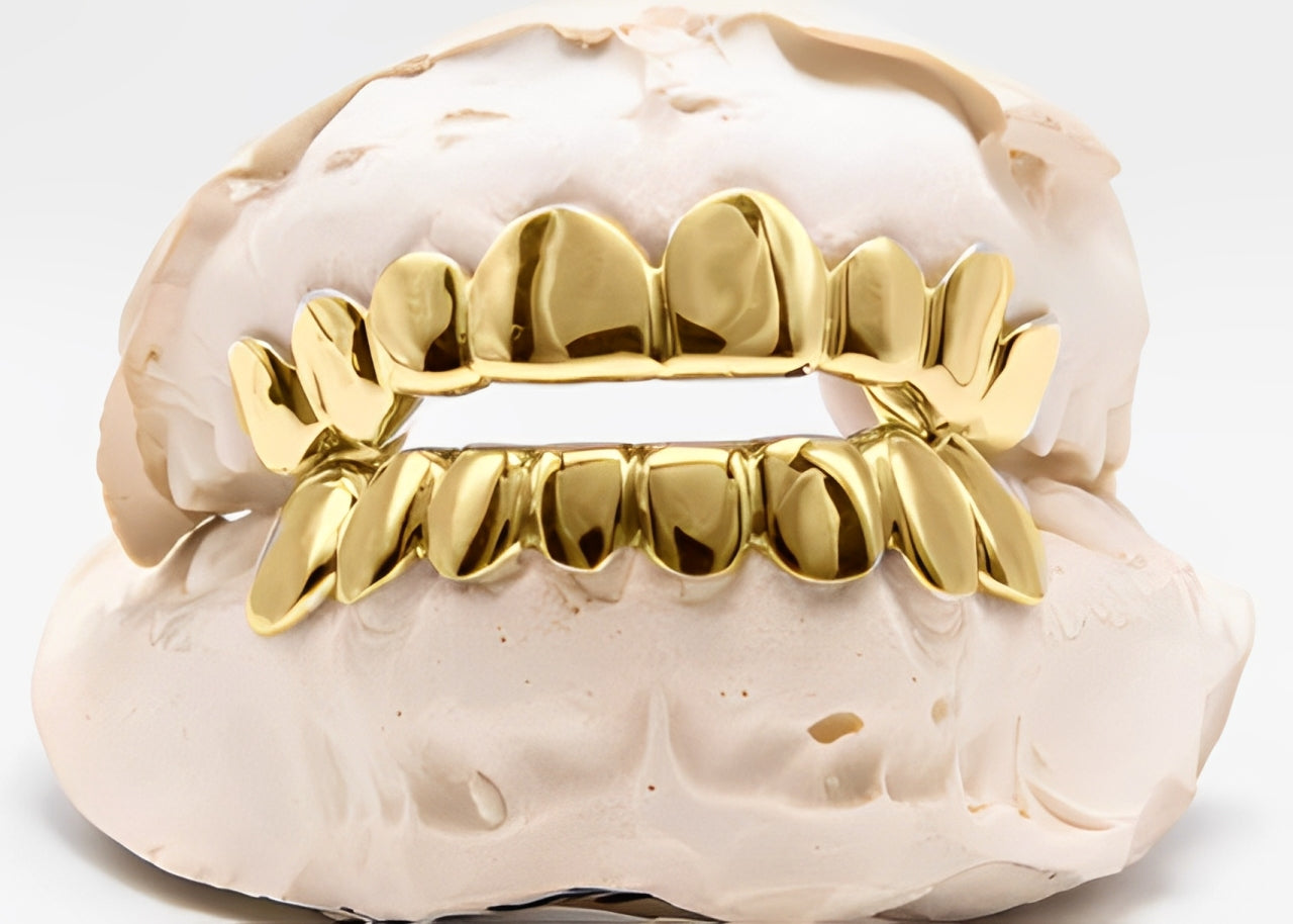 THE KODAK - YELLOW GOLD 16 TEETH